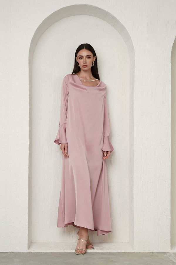Pink dress with pearl necklace