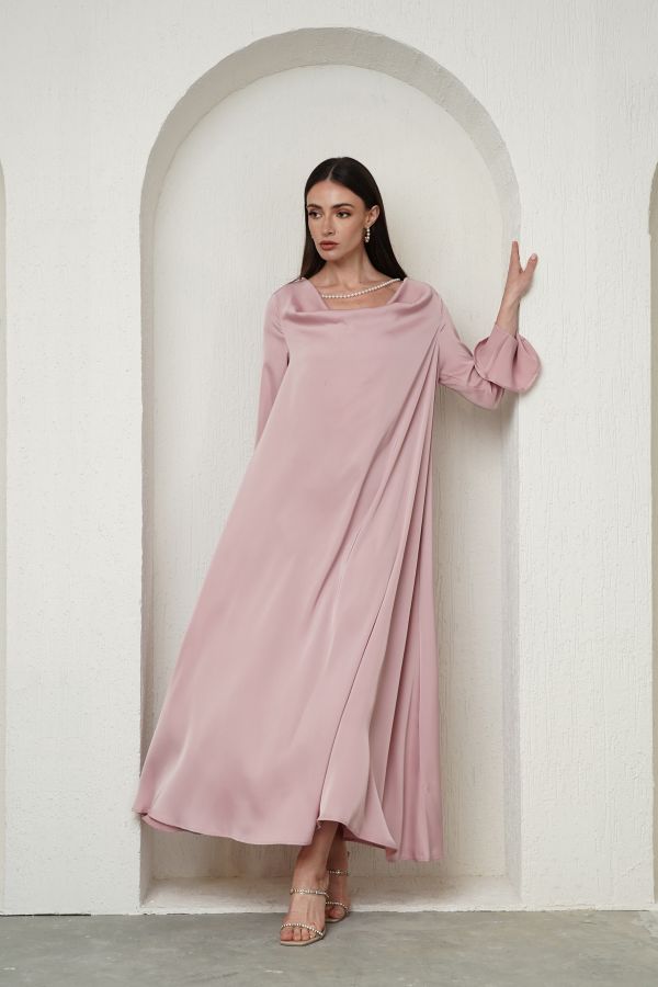 Pink dress with pearl necklace