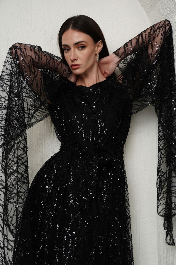 Black embellished dress with cape sleeves 