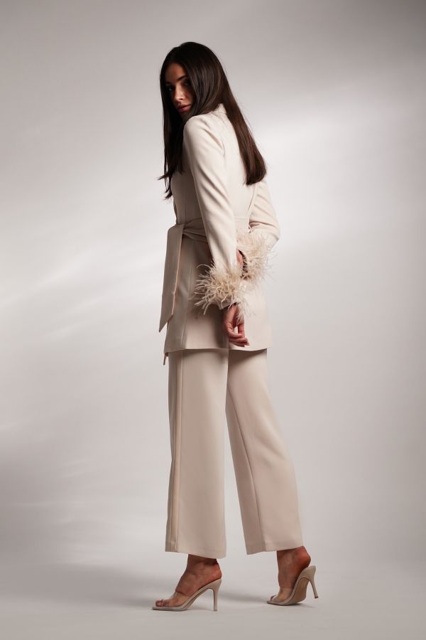 Beige jacket with feather sleeves