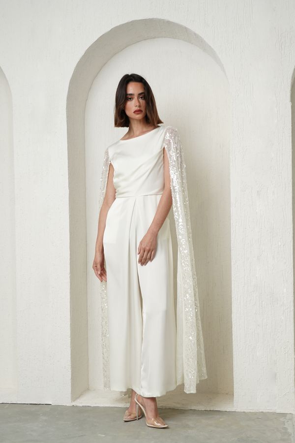 Off white jumpsuit with sequin cape sleeves