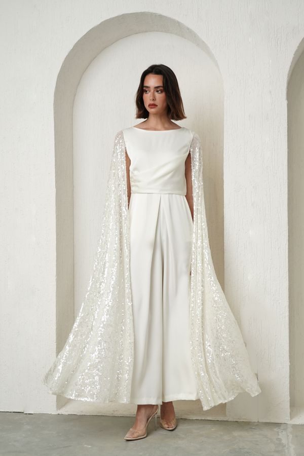 Off white jumpsuit with sequin cape sleeves