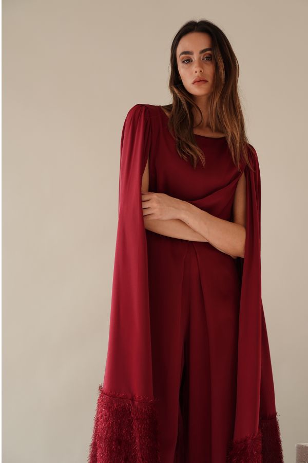 Burgundy jumpsuit with cape sleeves