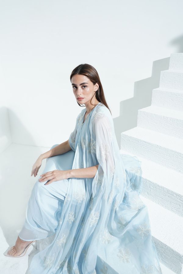 Blue embroidered dress with cape