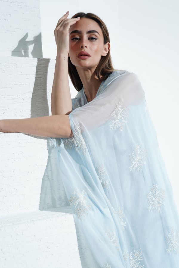 Blue embroidered dress with cape