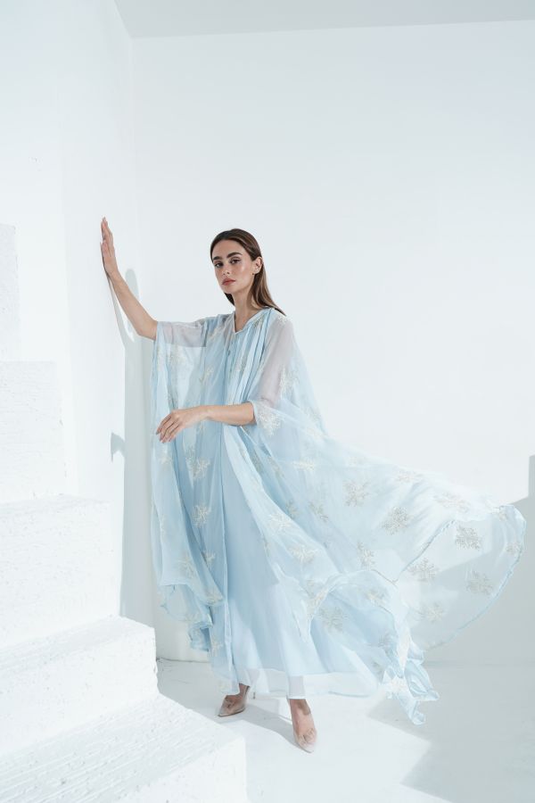 Blue embroidered dress with cape
