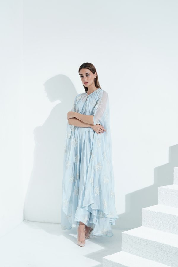 Blue embroidered dress with cape