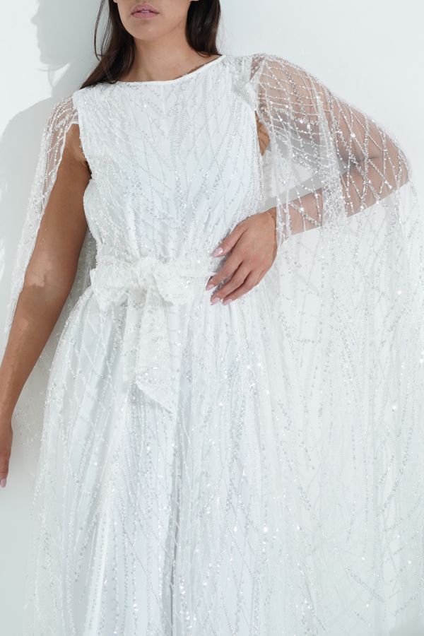 White embellished dress with cape sleeves