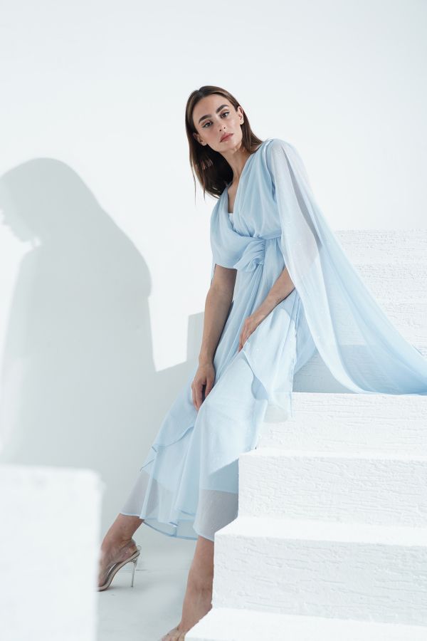 Blue cape dress with draped details 