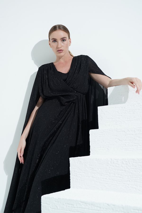 Black cape dress with draped details 