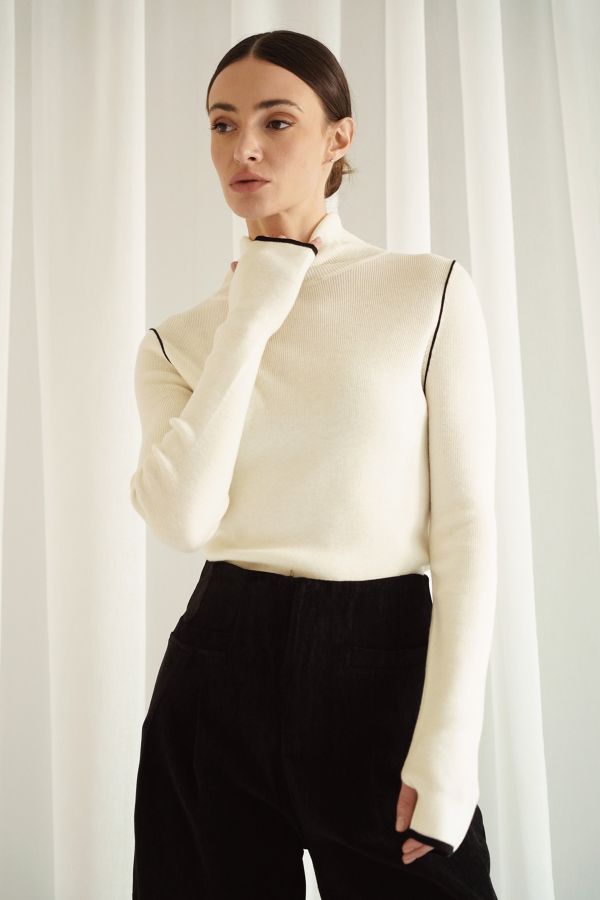 Cream shirt with black outlines