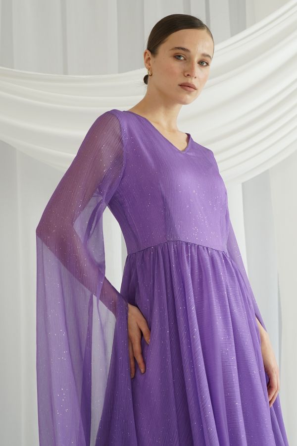 Purple dress with cape sleeves